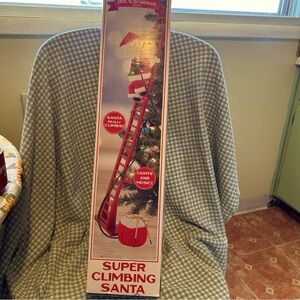 Mr Christmas Stepping Santa Climbing Ladder Lights plays 15 Carols Sleigh 2004